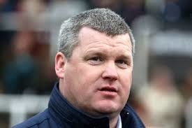 Which current trainer has won the Grand National most often?  