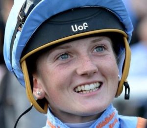 Where, and when, did Hollie Doyle ride her first winner under rules?  