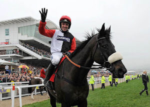 Which jockey rode Big Buck's in the Hennessy Gold Cup?  